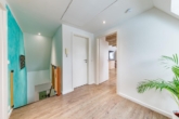 Flurbereich im Dachgeschoss - Lassen Sie sich begeistern: „Modernes Wohngefühl in Waldrandlage von Vossmoor“