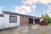 Straßenansicht - In gepflegter Lage: „Vermieteter Atrium-Bungalow mit Garage in Oststeinbek“