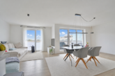 Lichtdurchfluteter Wohn- / Essbereich - In modernem Neubau: „Stilvolle 3‑Zimmer-Maisonettewohnung mit Dachterrasse“